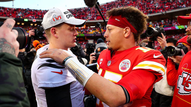 KANSAS CITY, MO - JANUARY 30: Joe Burrow #9 of the Cincinnati Bengals hugs Patrick Mahomes #15 of the Kansas City Chiefs after the AFC Championship Game at GEHA Field at Arrowhead Stadium on January 30, 2022 in Kansas City, Missouri.