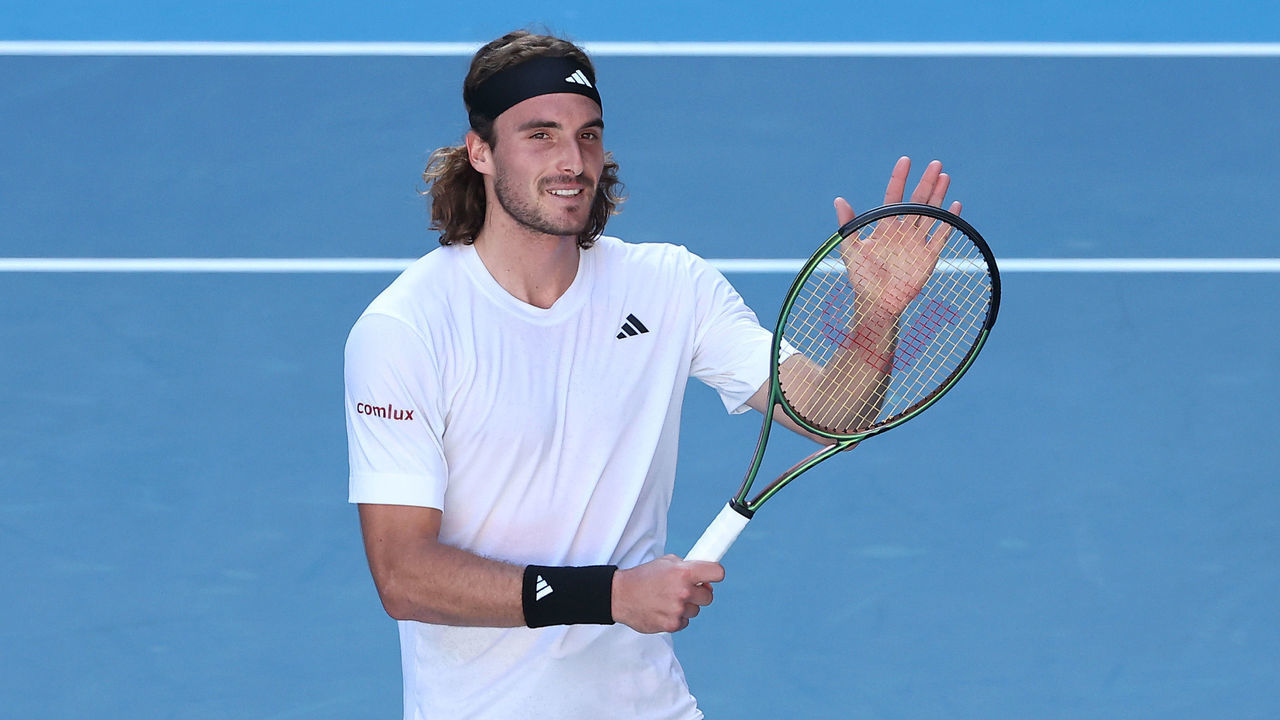 MELBOURNE, AUSTRALIA - JANUARY 27: Stefanos Tsitsipas of Greece celebrates winning match point in the Semifinal singles match against Karen Khachanov during day 12 of the 2023 Australian Open at Melbourne Park on January 27, 2023 in Melbourne, Australia.