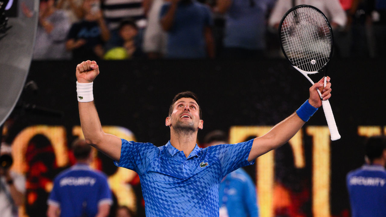 MELBOURNE, AUSTRALIA - JANUARY 27: Novak Djokovic celebrates victory after winning his Semi Final Match at the Australian Open grand slam tennis tournament at Melbourne Park in Melbourne, Australia on January 27, 2023