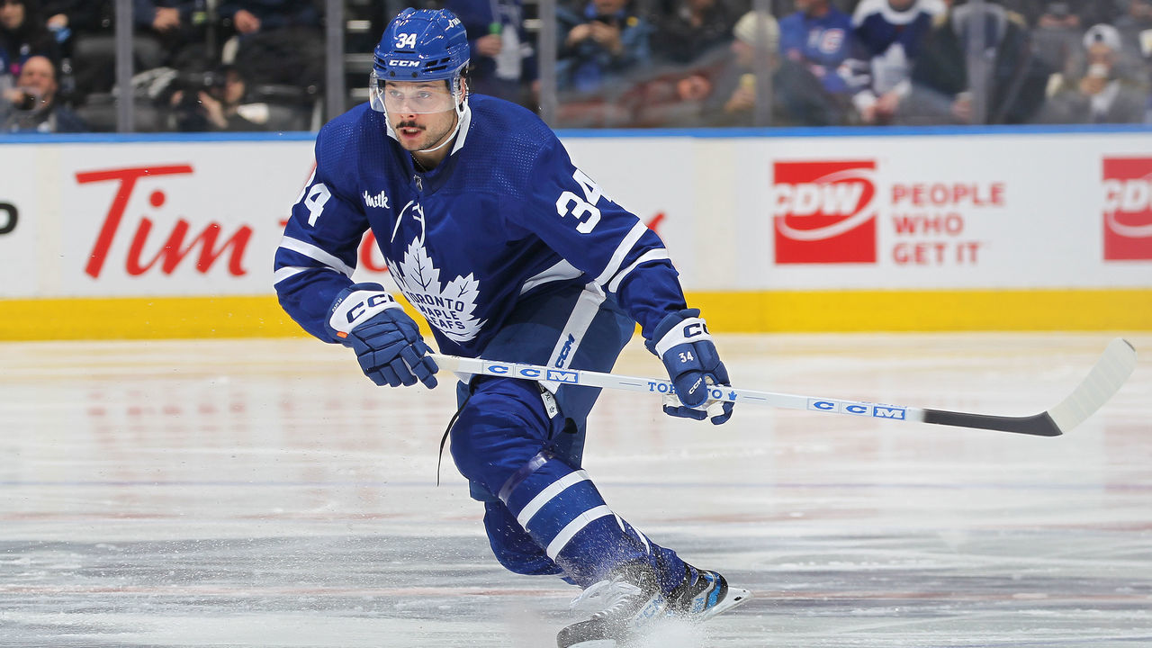 TORONTO, CANADA - JANUARY 25: Auston Matthews #34 of the Toronto Maple Leafs looks for a return pass against the New York Rangers during an NHL game at Scotiabank Arena on January 25, 2023 in Toronto, Ontario, Canada. The Maple Leafs defeated the Rangers 3-2 in overtime.