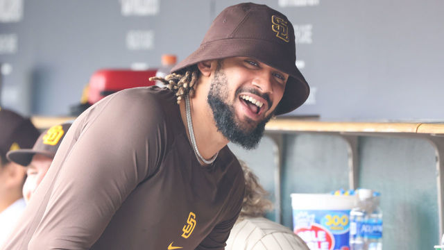 DETROIT, MI - JULY 27: San Diego Padres infielder Fernando Tatis Jr. laughs as he looks on from the dugout during a regular season Major League Baseball game between the San Diego Padres and the Detroit Tigers on July 27, 2022 at Comerica Park in Detroit, Michigan.