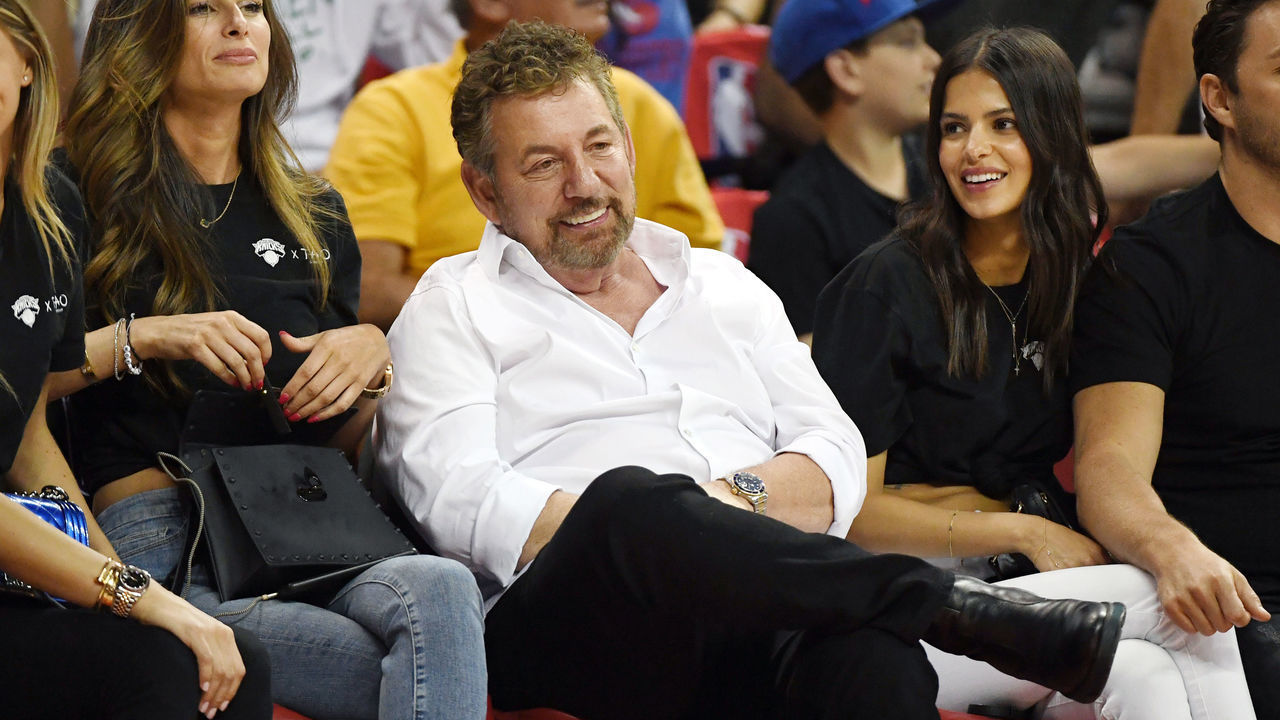 LAS VEGAS, NEVADA - JULY 07: (3rd L-R) Executive chairman and CEO of The Madison Square Garden Company and executive chairman of MSG Networks James L. Dolan, model Marcela Braga and Tao Group partner Jason Strauss attend a game between the New York Knicks and the Phoenix Suns during the 2019 NBA Summer League at the Thomas & Mack Center on July 7, 2019 in Las Vegas, Nevada.