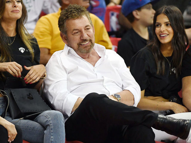 LAS VEGAS, NEVADA - JULY 07: (3rd L-R) Executive chairman and CEO of The Madison Square Garden Company and executive chairman of MSG Networks James L. Dolan, model Marcela Braga and Tao Group partner Jason Strauss attend a game between the New York Knicks and the Phoenix Suns during the 2019 NBA Summer League at the Thomas & Mack Center on July 7, 2019 in Las Vegas, Nevada.