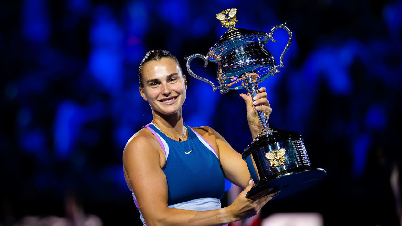 MELBOURNE, AUSTRALIA - JANUARY 28: Aryna Sabalenka of Belarus poses with the champions trophy after defeating Elena Rybakina of Kazakhstan in the womens singles final on Day 13 of the 2023 Australian Open at Melbourne Park on January 28, 2023 in Melbourne, Australia
