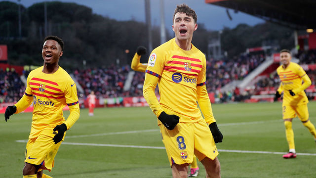 GIRONA, SPAIN - JANUARY 28: Pedri Gonzalez of FC Barcelona celebrates the victory with Ansu Fati of FC Barcelona during the La Liga Santander match between Girona v FC Barcelona at the Estadi Municipal Montilivi on January 28, 2023 in Girona Spain