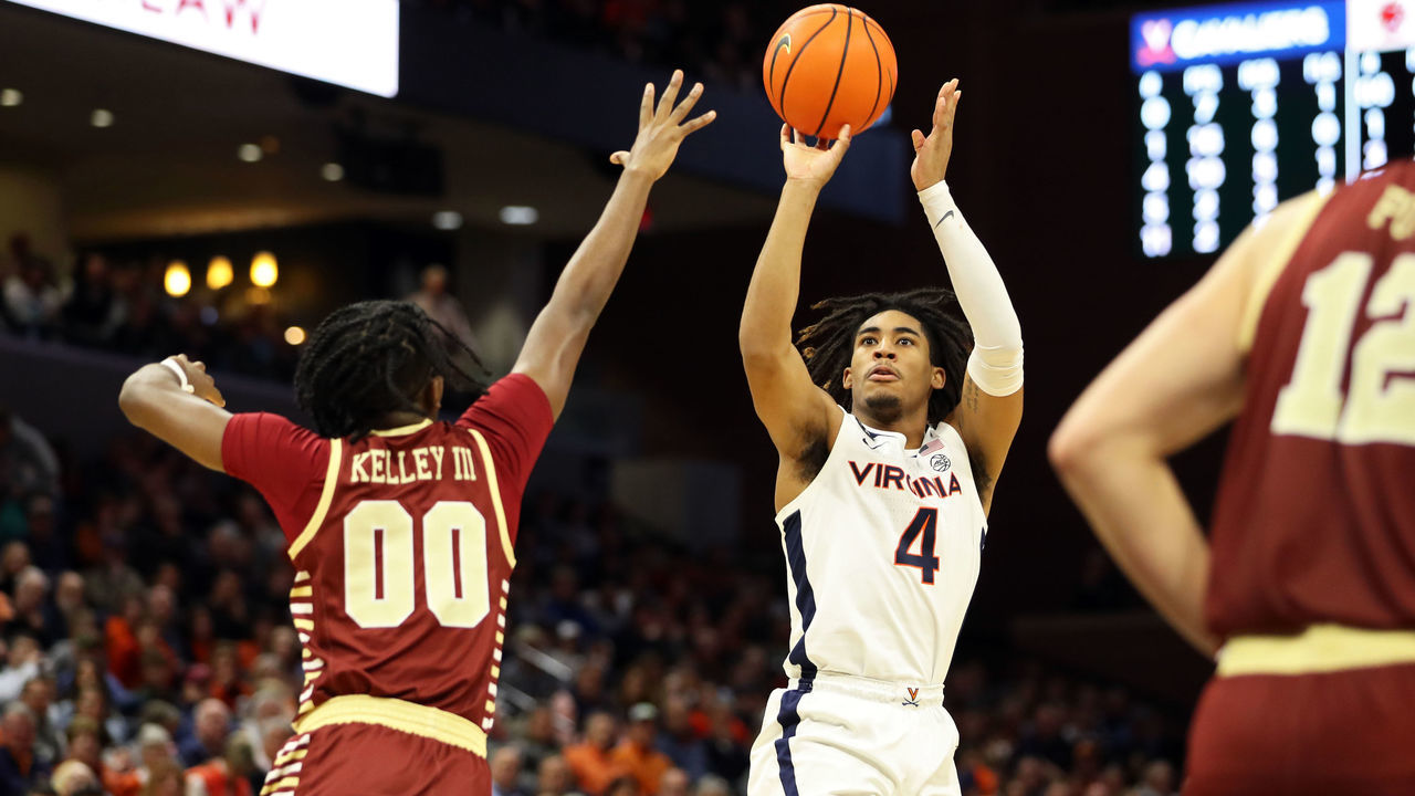 CHARLOTTESVILLE, VA - JANUARY 28: Armaan Franklin #4 of the Virginia Cavaliers shoots over Chas Kelley III #00 of the Boston College Eagles in the second half during a game at John Paul Jones Arena on January 28, 2023 in Charlottesville, Virginia.