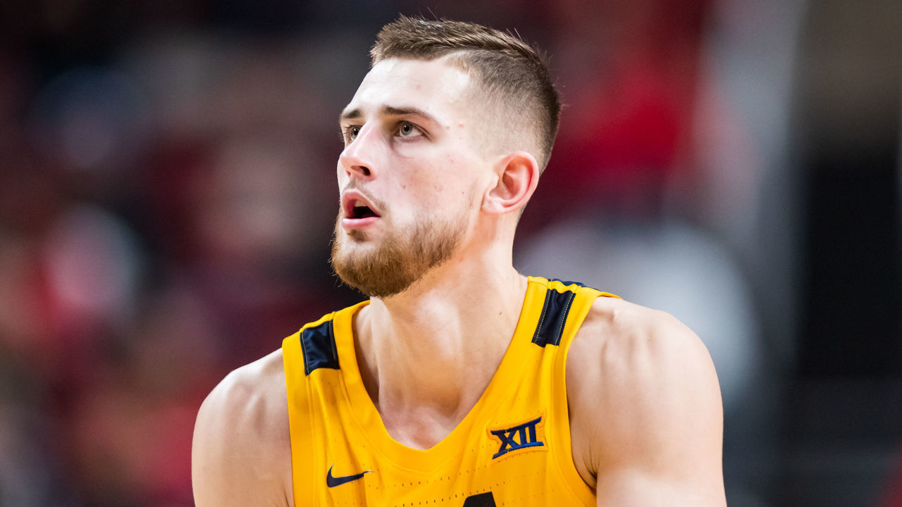 LUBBOCK, TEXAS - JANUARY 25: Guard Erik Stevenson #10 of the West Virginia Mountaineers shoots the ball during the second half of the college basketball game against the Texas Tech Red Raiders at United Supermarkets Arena on January 25, 2023 in Lubbock, Texas.