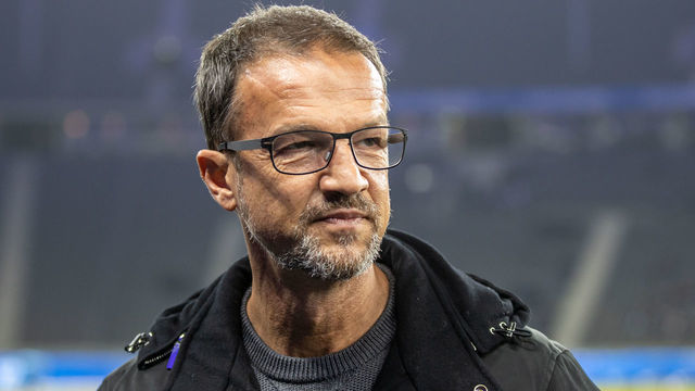 24 January 2023, Berlin: Berlin, 24.01.2023, Soccer, Bundesliga, Matchday 17, Hertha BSC - VfL Wolfsburg, Olympic Stadium. Fredi Bobic, managing director of Hertha BSC smiles. DFL regulations and DFB regulations prohibit any use of photographs as image sequences and/or quasi-video, Photo: Andreas Gora Photo: Andreas Gora/dpa - IMPORTANT NOTE: In accordance with the requirements of the DFL Deutsche Fußball Liga and the DFB Deutscher Fußball-Bund, it is prohibited to use or have used photographs taken in the stadium and/or of the match in the form of sequence pictures and/or video-like photo series.