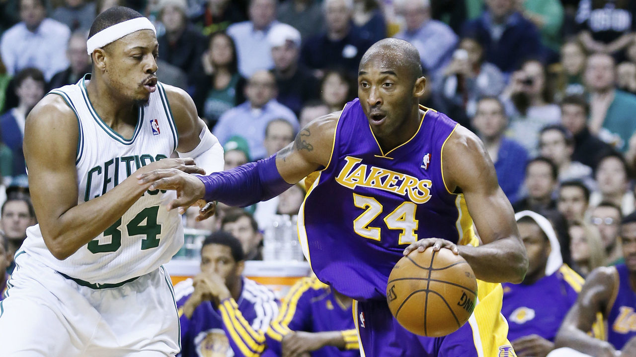 BOSTON, MA - FEBRUARY 7: Los Angeles Lakers shooting guard Kobe Bryant (24) drives past Boston Celtics small forward Paul Pierce (34) during the Boston Celtics 116-95 victory over the Los Angeles Lakers at TD Garden on February 7, 2013 in Boston, Massachusetts.