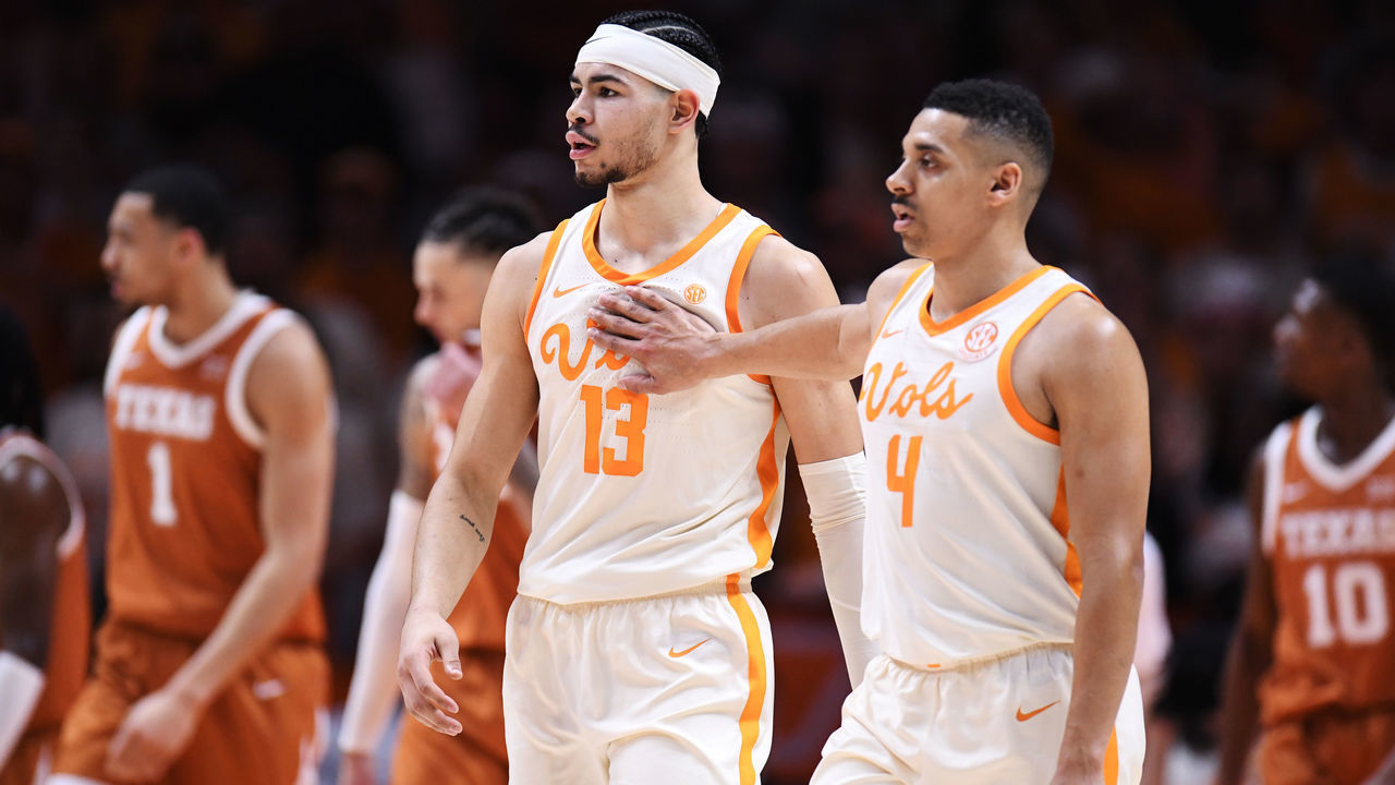KNOXVILLE, TENNESSEE - JANUARY 28: Olivier Nkamhoua #13 and Tyreke Key #4 of the Tennessee Volunteers react after a foul is called in the first half of the game against the Texas Longhorns at Thompson-Boling Arena on January 28, 2023 in Knoxville, Tennessee.
