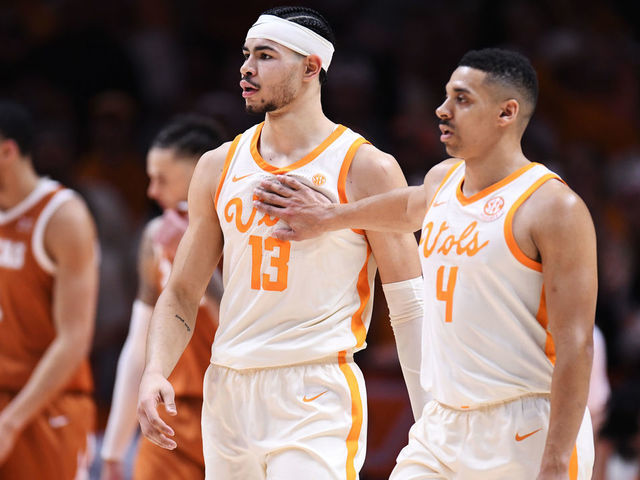 KNOXVILLE, TENNESSEE - JANUARY 28: Olivier Nkamhoua #13 and Tyreke Key #4 of the Tennessee Volunteers react after a foul is called in the first half of the game against the Texas Longhorns at Thompson-Boling Arena on January 28, 2023 in Knoxville, Tennessee.