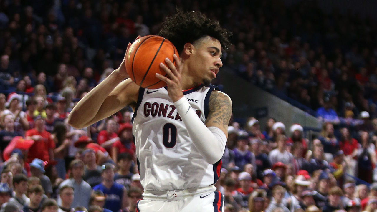 SPOKANE, WASHINGTON - DECEMBER 09: Julian Strawther #0 of the Gonzaga Bulldogs controls a rebound against the Washington Huskies in the second half of the game at McCarthey Athletic Center on December 09, 2022 in Spokane, Washington. Gonzaga defeats Washington 77-60.
