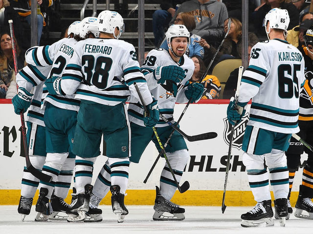 PITTSBURGH, PA - JANUARY 28: Logan Couture #39 of the San Jose Sharks celebrates his third period goal against the Pittsburgh Penguins at PPG PAINTS Arena on January 28, 2023 in Pittsburgh, Pennsylvania.
