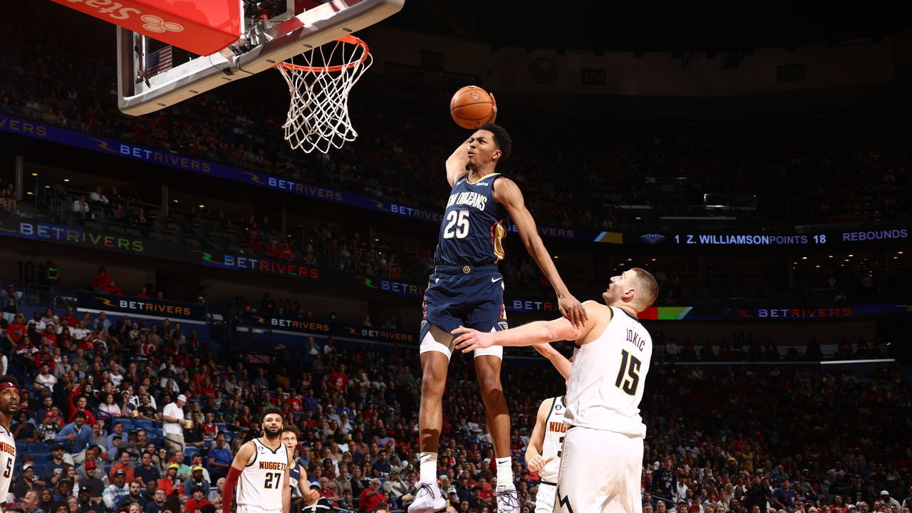 NEW ORLEANS, LA - DECEMBER 4: Trey Murphy III #25 of the New Orleans Pelicans dunks the ball during the game against the Denver Nuggets on December 4, 2022 at the Smoothie King Center in New Orleans, Louisiana. Mandatory Copyright Notice: Copyright 2022 NBAE