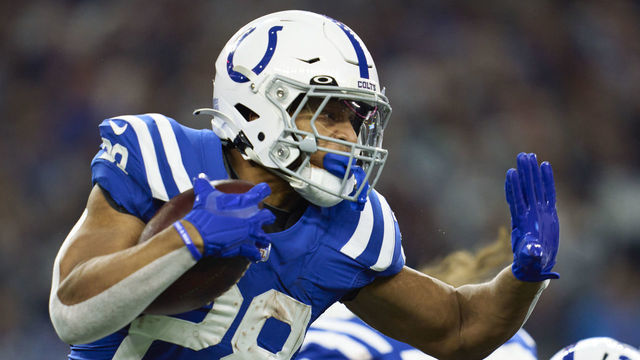 ARLINGTON, TX - DECEMBER 04: Jonathan Taylor #28 of the Indianapolis Colts carries the ball against the Dallas Cowboys during the first half at AT&T Stadium on December 4, 2022 in Arlington, Texas.