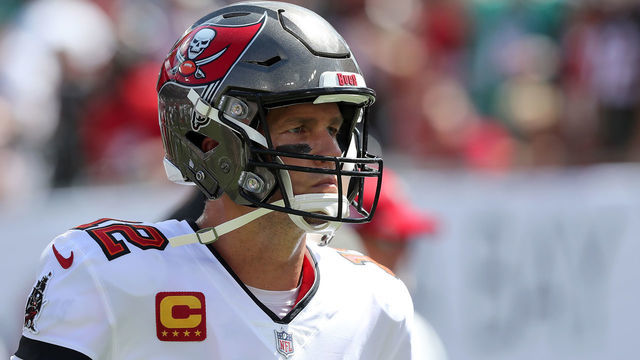 TAMPA, FL - OCTOBER 10: Tampa Bay Buccaneers Quarterback Tom Brady (12) heads to the lockerroom before the regular season game between the Miami Dolphins and the Tampa Bay Buccaneers on October 10, 2021 at Raymond James Stadium in Tampa, Florida.