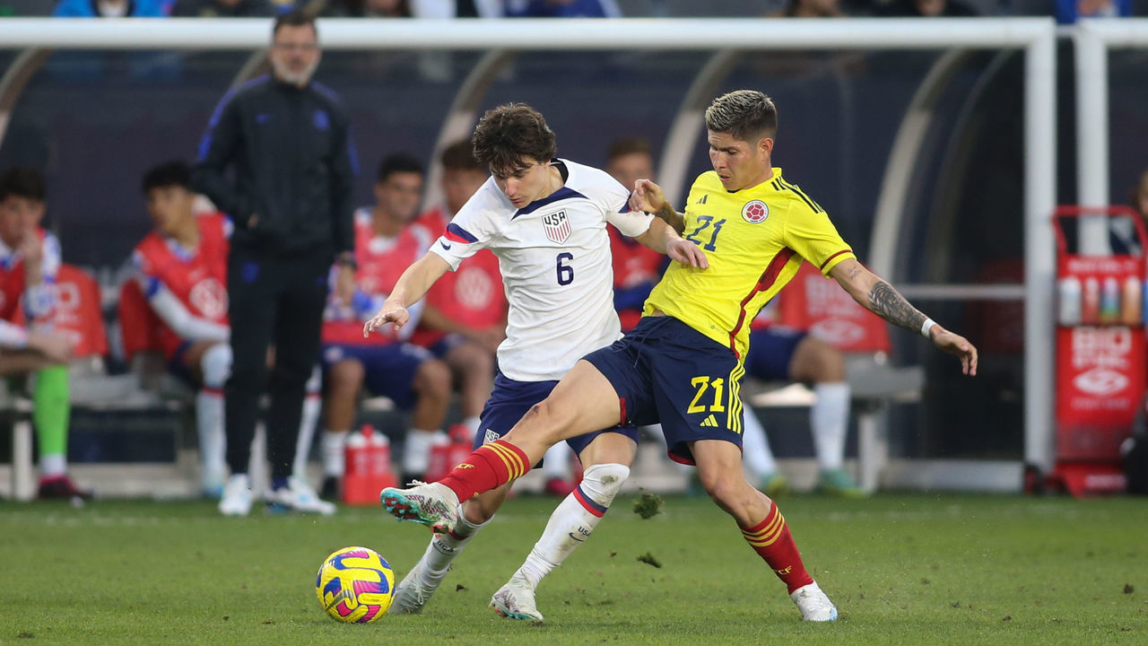 CARSON, CA - JANUARY 28: Paxten Aaronson #6 of the United States battles for the ball with Jorman Campuzano #21 of Colombia during a game between Colombia and the United States at Dignity Health Sports Park on January 28, 2023 in Carson, California.