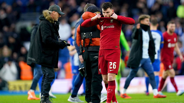 Liverpool's Andrew Robertson appears dejected at the end of the Emirates FA Cup fourth round match at the AMEX Stadium, Brighton. Picture date: Sunday January 29, 2023.
