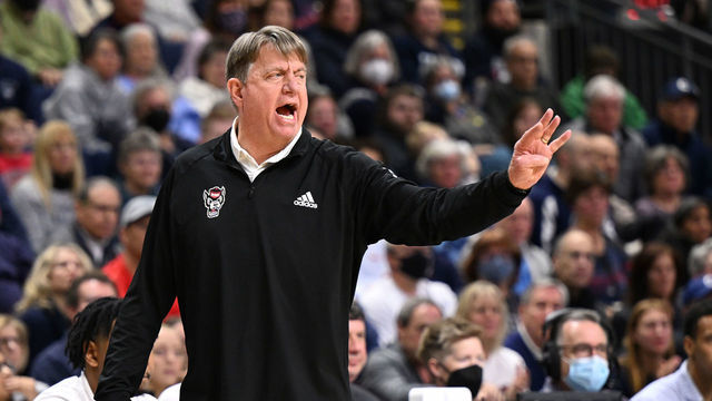 BRIDGEPORT, CT - MARCH 28: N.C. State Wolfpack head coach Wes Moore calls out a play to his team as they play the Connecticut Huskies during the Elite Eight round of the 2022 NCAA Womens Basketball Tournament held at Total Mortgage Arena at Harbor Yard on March 28, 2022 in Bridgeport, Connecticut.