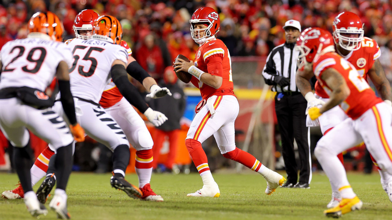 KANSAS CITY, MISSOURI - JANUARY 29: Patrick Mahomes #15 of the Kansas City Chiefs looks to pass against the Cincinnati Bengals during the first quarter in the AFC Championship Game at GEHA Field at Arrowhead Stadium on January 29, 2023 in Kansas City, Missouri.
