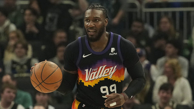 MILWAUKEE, WISCONSIN - MARCH 06: Jae Crowder #99 of the Phoenix Suns dribbles the ball against the Milwaukee Bucks during the first half at Fiserv Forum on March 06, 2022 in Milwaukee, Wisconsin.