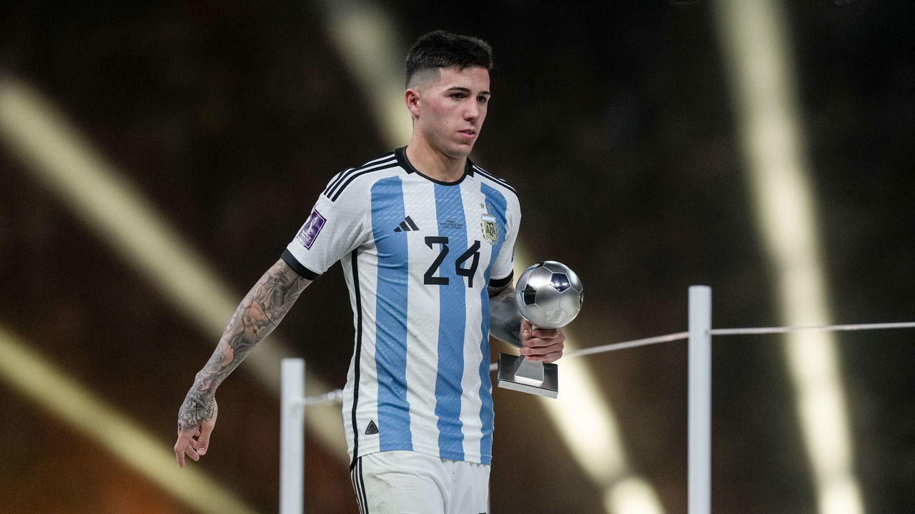 LUSAIL CITY, QATAR - DECEMBER 18: Enzo Fernandez of Argentina with the trophy of the Best Young Player of the Tournament after the FIFA World Cup Qatar 2022 Final match between Argentina and France at Lusail Stadium on December 18, 2022 in Lusail City, Qatar.