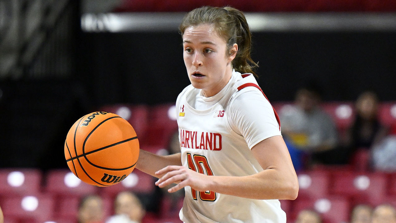 COLLEGE PARK, MARYLAND - JANUARY 26: Abby Meyers #10 of the Maryland Terrapins handles the ball against the Michigan Wolverines at Xfinity Center on January 26, 2023 in College Park, Maryland.