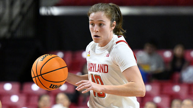 COLLEGE PARK, MARYLAND - JANUARY 26: Abby Meyers #10 of the Maryland Terrapins handles the ball against the Michigan Wolverines at Xfinity Center on January 26, 2023 in College Park, Maryland.