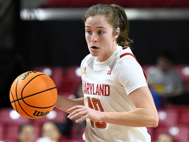 COLLEGE PARK, MARYLAND - JANUARY 26: Abby Meyers #10 of the Maryland Terrapins handles the ball against the Michigan Wolverines at Xfinity Center on January 26, 2023 in College Park, Maryland.