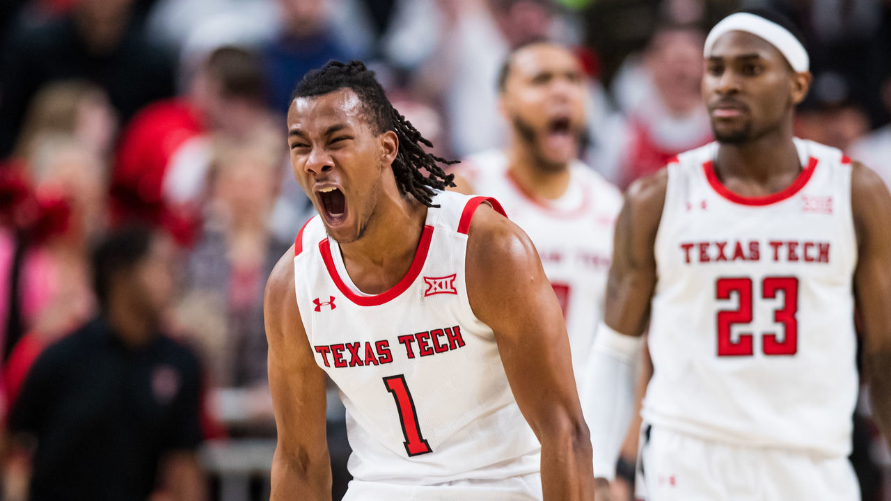 LUBBOCK, TEXAS - JANUARY 30: Guard Lamar Washington #1 of the Texas Tech Red Raiders shouts after drawing a charge during the second half of the college basketball game against the Iowa State Cyclones at United Supermarkets Arena on January 30, 2023 in Lubbock, Texas.