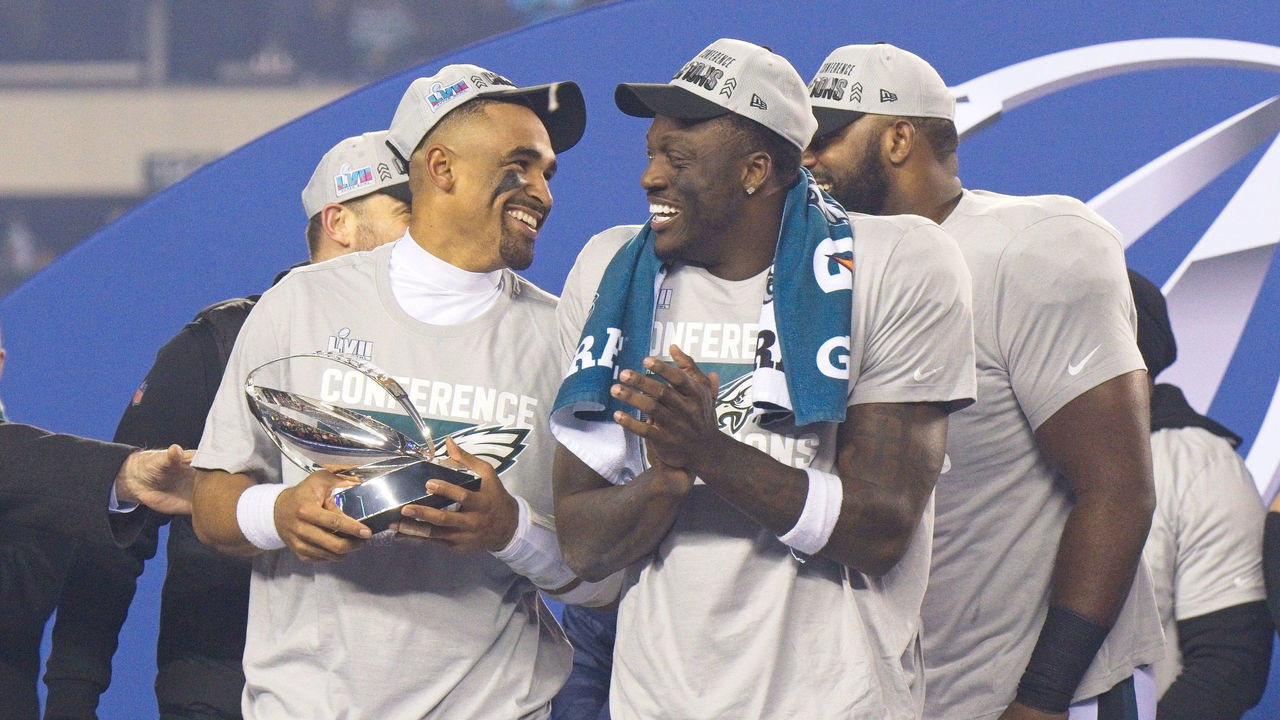 PHILADELPHIA, PA - JANUARY 29: Philadelphia Eagles quarterback Jalen Hurts (1) and Philadelphia Eagles wide receiver A.J. Brown (11) hold the trophy during the Championship game between the San Fransisco 49ers and the Philadelphia Eagles on January 29, 2023.
