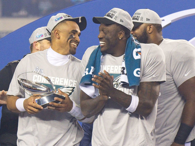 PHILADELPHIA, PA - JANUARY 29: Philadelphia Eagles quarterback Jalen Hurts (1) and Philadelphia Eagles wide receiver A.J. Brown (11) hold the trophy during the Championship game between the San Fransisco 49ers and the Philadelphia Eagles on January 29, 2023.