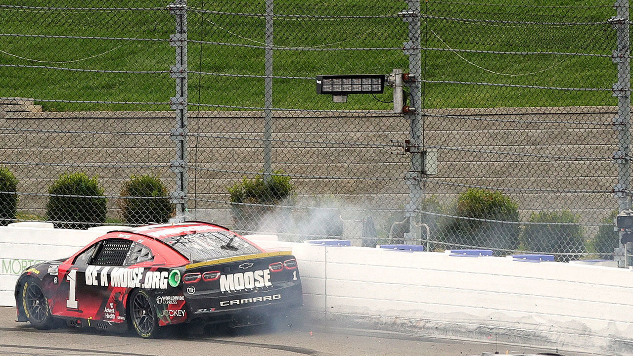 MARTINSVILLE, VIRGINIA - OCTOBER 30: Ross Chastain, driver of the #1 Moose Fraternity Chevrolet, rides the wall on the final lap of the NASCAR Cup Series Xfinity 500 at Martinsville Speedway on October 30, 2022 in Martinsville, Virginia.