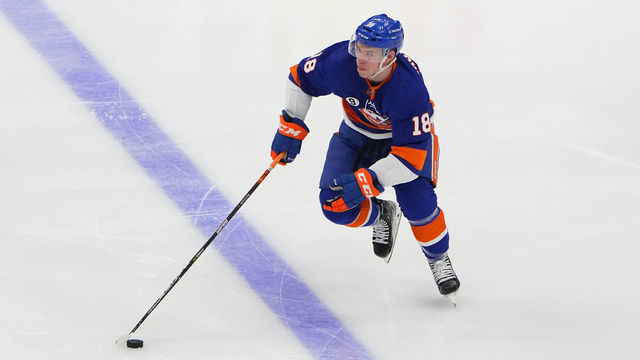 ELMONT, NY - MARCH 03: New York Islanders Left Wing Anthony Beauvillier (18) controls the puck during the first period of the National Hockey League game between the Vancouver Canucks and the New York Islanders on March 3, 2022, at UBS Arena in Elmont, NY.
