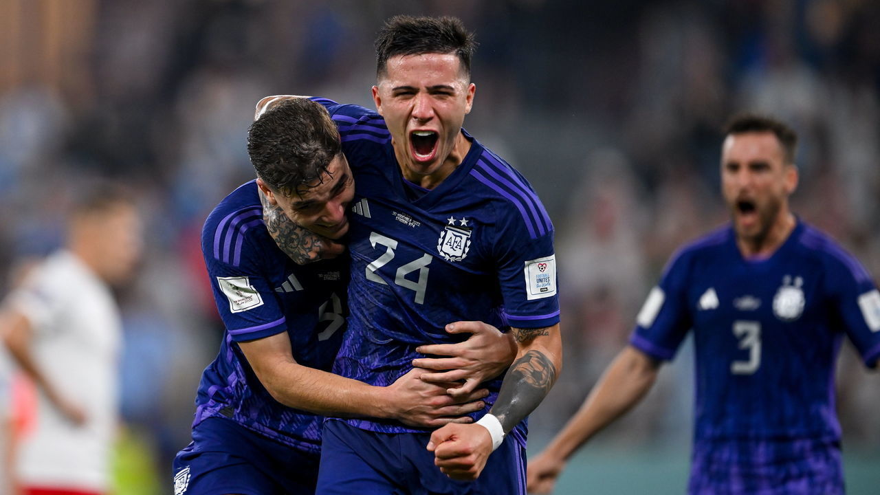DOHA, QATAR - NOVEMBER 30: Julian Alvarez of Argentina (L) celebrates with team-mate Enzo Fernández after scoring their side;'s second goal during the FIFA World Cup Qatar 2022 Group C match between Poland and Argentina at Stadium 974 on November 30, 2022 in Doha, Qatar.