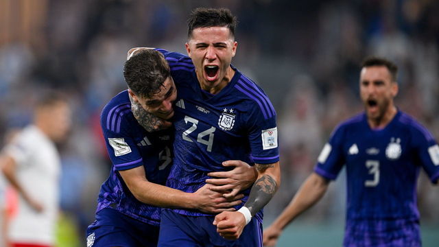 DOHA, QATAR - NOVEMBER 30: Julian Alvarez of Argentina (L) celebrates with team-mate Enzo Fernández after scoring their side;'s second goal during the FIFA World Cup Qatar 2022 Group C match between Poland and Argentina at Stadium 974 on November 30, 2022 in Doha, Qatar.