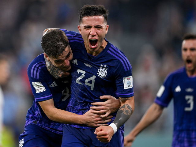 DOHA, QATAR - NOVEMBER 30: Julian Alvarez of Argentina (L) celebrates with team-mate Enzo Fernández after scoring their side;'s second goal during the FIFA World Cup Qatar 2022 Group C match between Poland and Argentina at Stadium 974 on November 30, 2022 in Doha, Qatar.