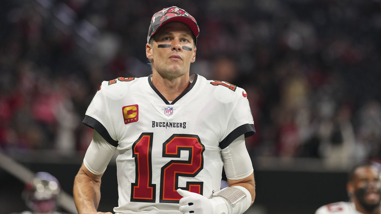 ATLANTA, GA - JANUARY 08: Tom Brady #12 of the Tampa Bay Buccaneers runs onto the field during introductions against the Atlanta Falcons at Mercedes-Benz Stadium on January 8, 2023 in Atlanta, Georgia.