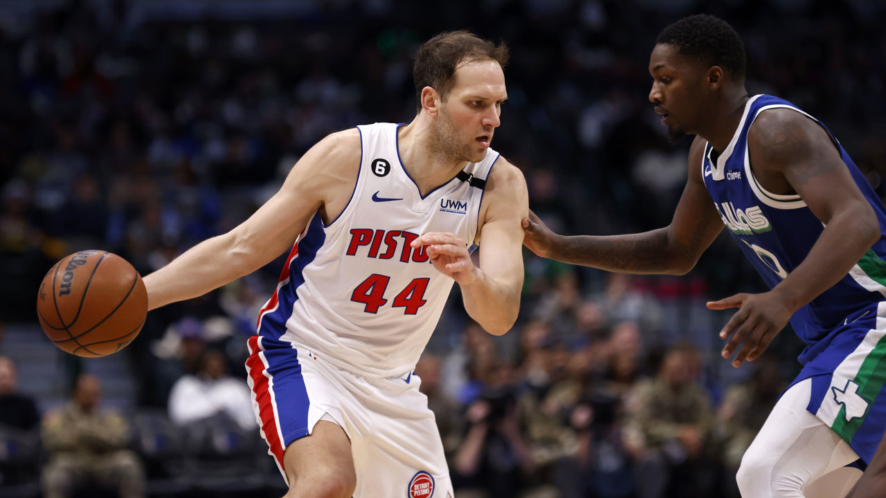 DALLAS, TX - JANUARY 30: Bojan Bogdanovic #44 of the Detroit Pistons handles the ball as Dorian Finney-Smith #10 of the Dallas Mavericks defends in the second half at American Airlines Center on January 30, 2023 in Dallas, Texas. The Mavericks won 111-105.