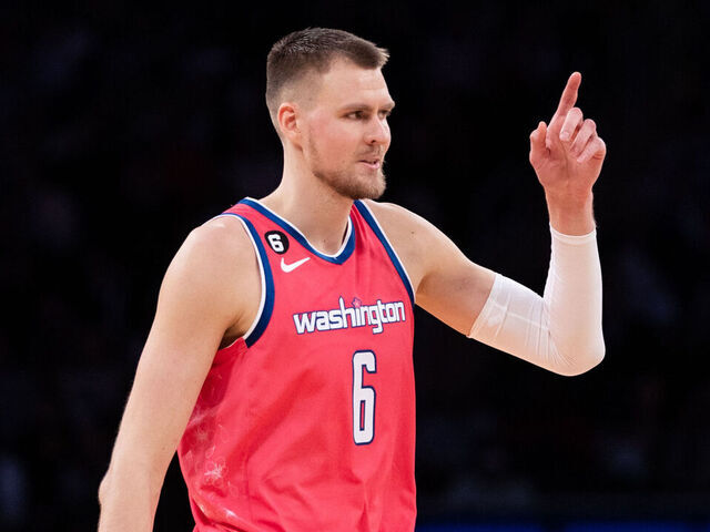NEW YORK, NEW YORK - JANUARY 18: Kristaps Porzingis #6 of the Washington Wizards gestures to a teammate during the third quarter of the game against the New York Knicks at Madison Square Garden on January 18, 2023 in New York City.