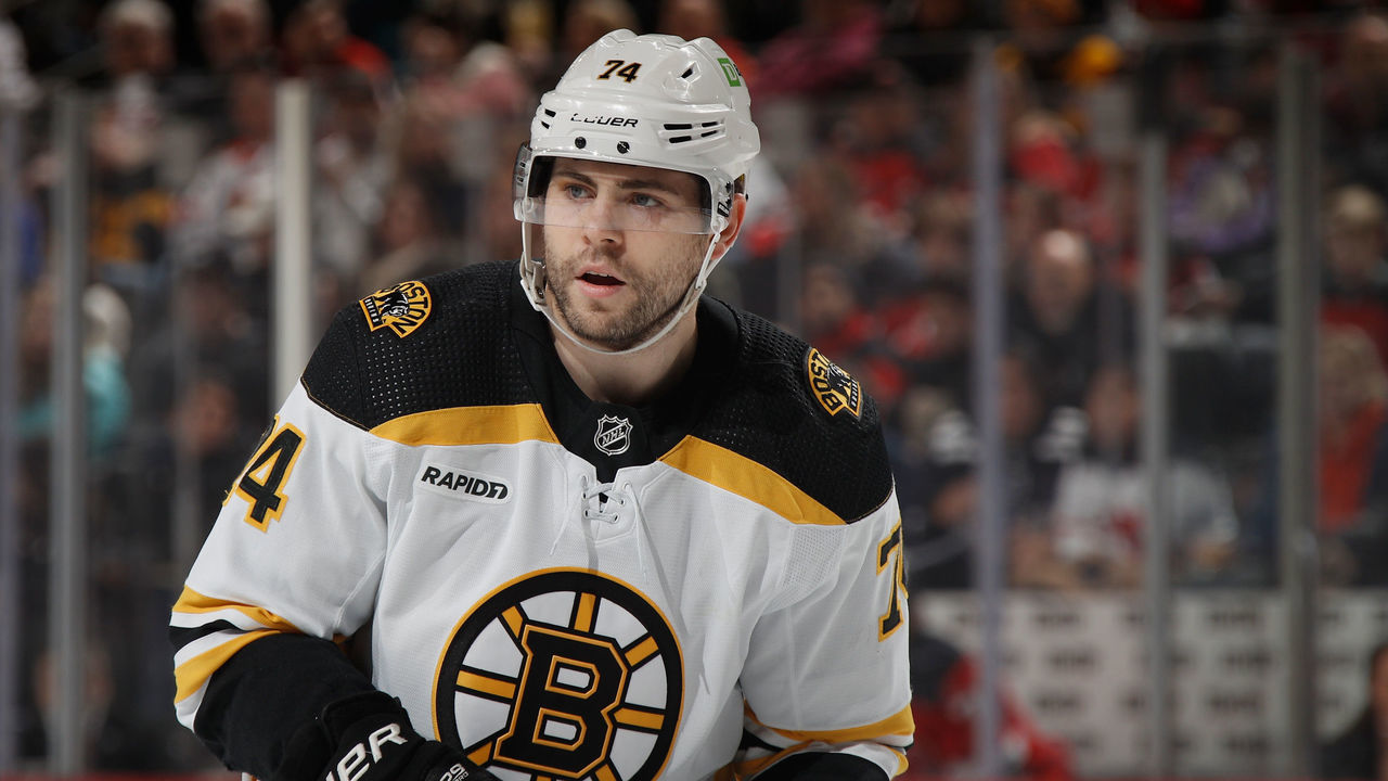 NEWARK, NEW JERSEY - DECEMBER 28: Jake DeBrusk #74 of the Boston Bruins skates against the New Jersey Devils at the Prudential Center on December 28, 2022 in Newark, New Jersey.