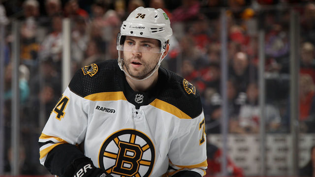 NEWARK, NEW JERSEY - DECEMBER 28: Jake DeBrusk #74 of the Boston Bruins skates against the New Jersey Devils at the Prudential Center on December 28, 2022 in Newark, New Jersey.