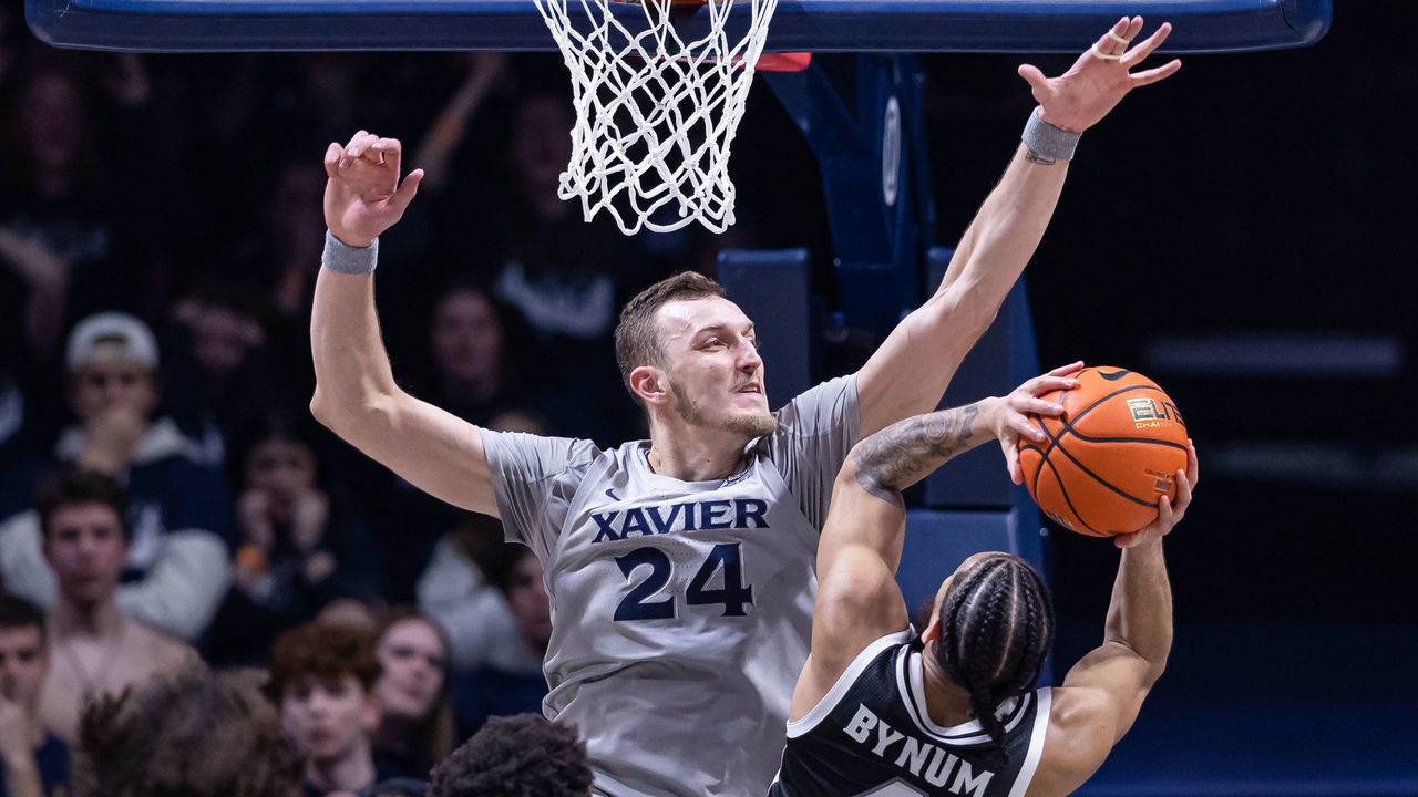CINCINNATI, OH - FEBRUARY 01: Jack Nunge #24 of the Xavier Musketeers defends against a shot from Jared Bynum #4 of the Providence Friars during the second half at Cintas Center on February 1, 2023 in Cincinnati, Ohio.