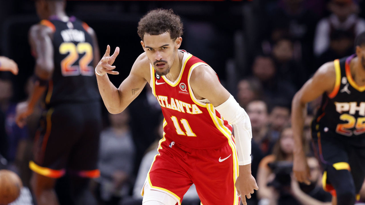 PHOENIX, ARIZONA - FEBRUARY 01: Trae Young #11 of the Atlanta Hawks gestures after hitting a three-point basket in the second half against the Phoenix Suns at Footprint Center on February 01, 2023 in Phoenix, Arizona. NOTE TO USER: User expressly acknowledges and agrees that, by downloading and or using this photograph, User is consenting to the terms and conditions of the Getty Images License Agreement.