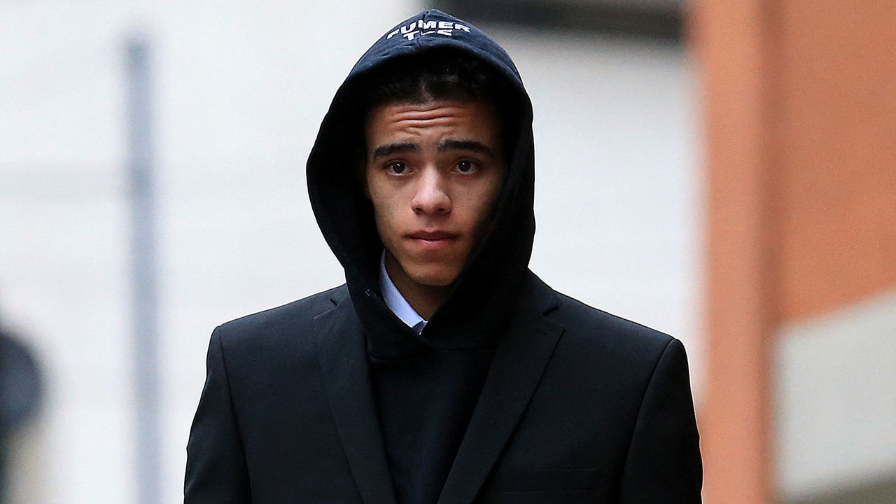 England and Manchester United footballer Mason Greenwood leaves Minshull Street Crown Court in Manchester on November 21, 2022 after a preliminary hearing on charges of attempted rape, controlling and coercive behaviour, and assault. - The 21-year-old was first arrested in January over allegations relating to a young woman after images and videos were posted online. All three charges relate to the same complainant.