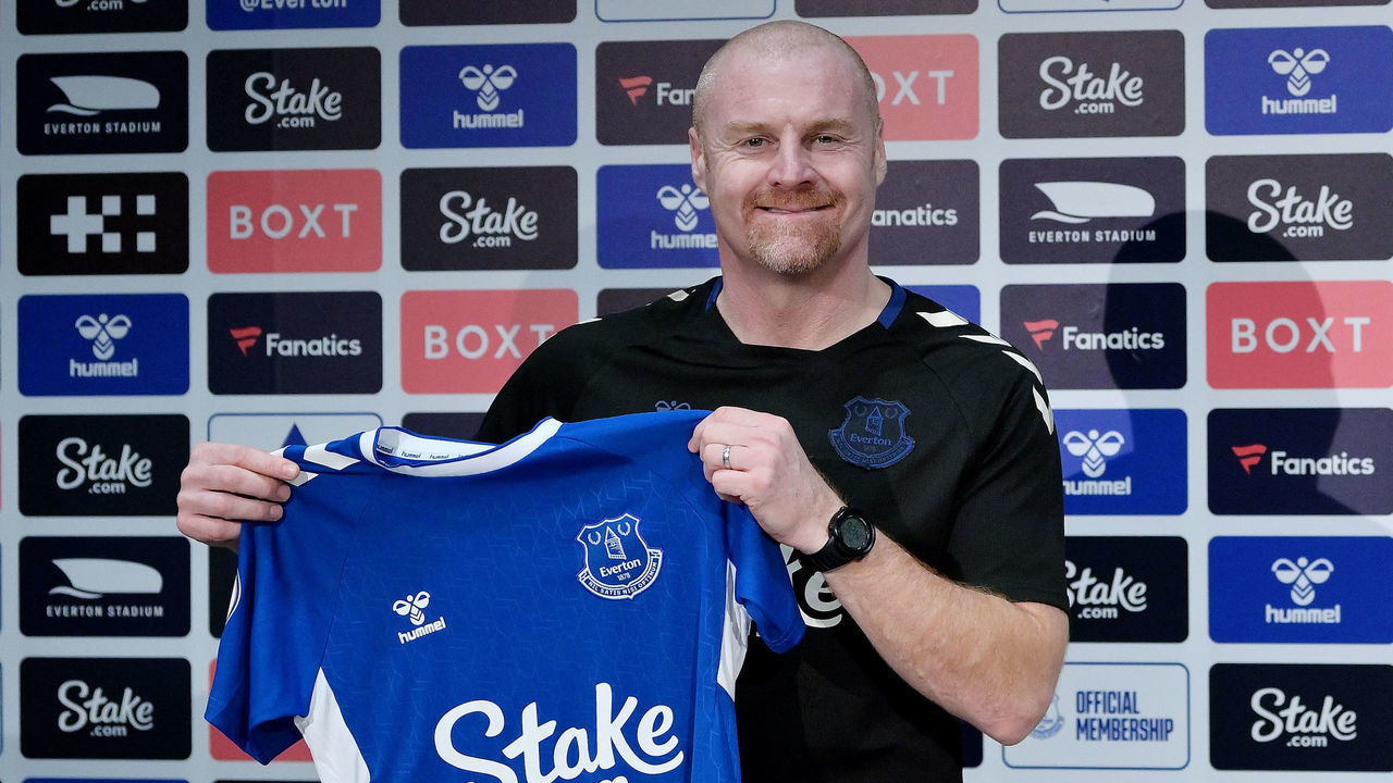 HALEWOOD, ENGLAND - FEBRUARY 02: (EXCLUSIVE COVERAGE) Sean Dyche holds up an Everton shirt before he speaks to the media during the Everton Press Conference at Finch Farm on February 02, 2023 in Halewood, England.