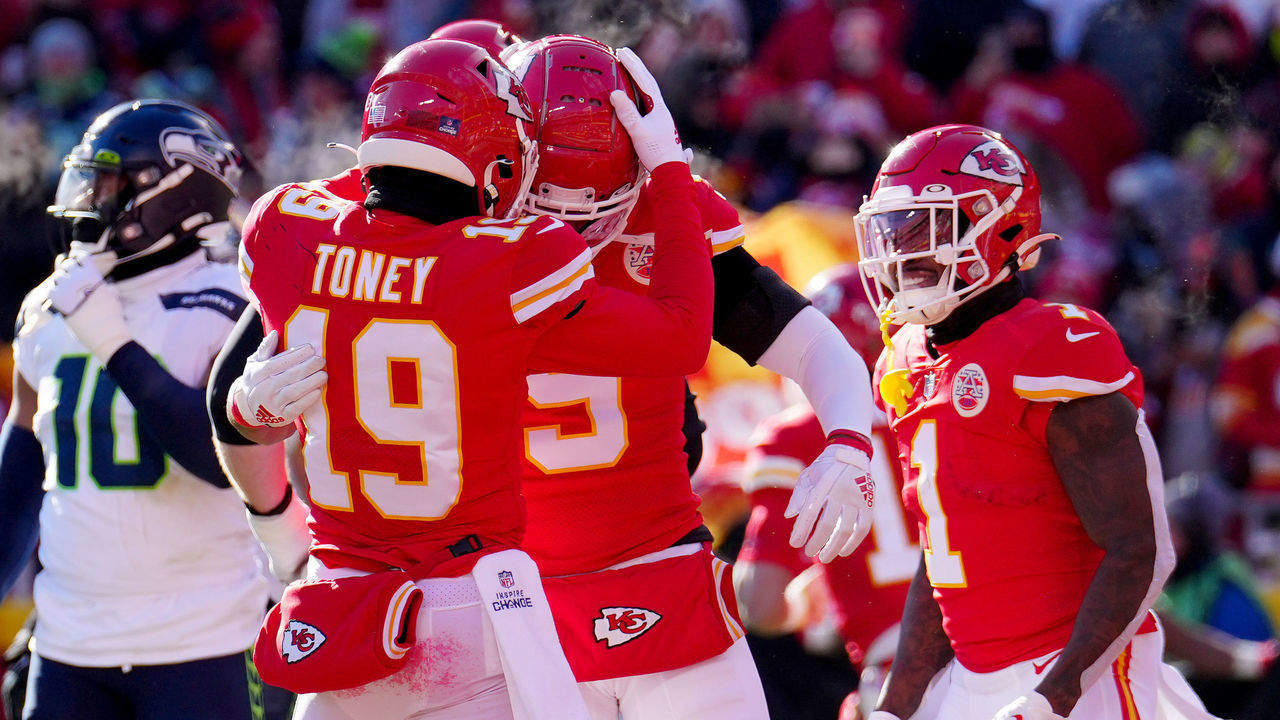 KANSAS CITY, MISSOURI - DECEMBER 24: Kadarius Toney #19 of the Kansas City Chiefs celebrates with JuJu Smith-Schuster #9 of the Kansas City Chiefs after Toney's touchdown during the first quarter against the Seattle Seahawks at Arrowhead Stadium on December 24, 2022 in Kansas City, Missouri.