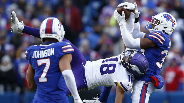 ORCHARD PARK, NEW YORK - NOVEMBER 13: Justin Jefferson #18 of the Minnesota Vikings catches a pass in front of Cam Lewis #39 of the Buffalo Bills during the fourth quarter at Highmark Stadium on November 13, 2022 in Orchard Park, New York.