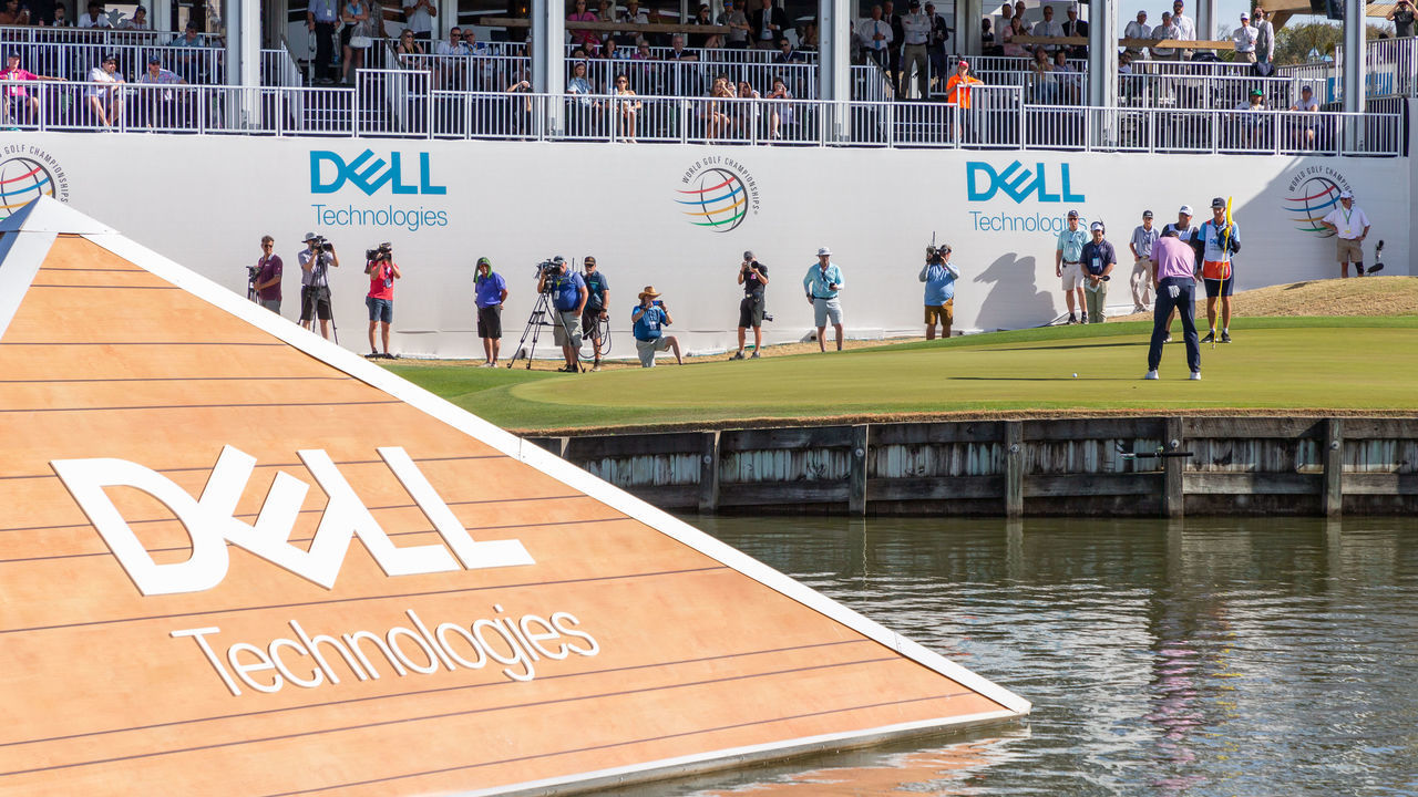 AUSTIN, TX - MARCH 27: Scottie Scheffler sinks a putt while surrounded by Dell Technologies signs during the Championship Match of the PGA - World Golf Championships-Dell Technologies Match Play on March 27, 2022, at Austin County Club in Austin, TX.