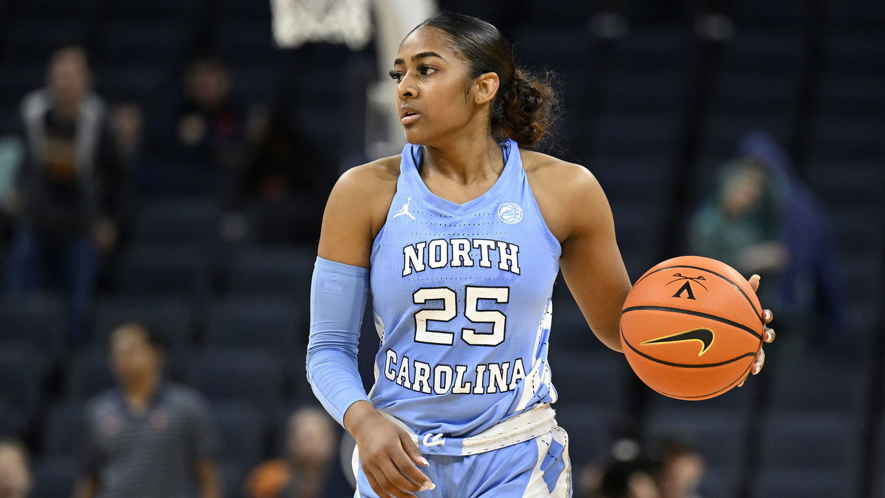 CHARLOTTESVILLE, VIRGINIA - JANUARY 12: Deja Kelly #25 of the North Carolina Tar Heels handles the ball against the Virginia Cavaliers at John Paul Jones Arena on January 12, 2023 in Charlottesville, Virginia.